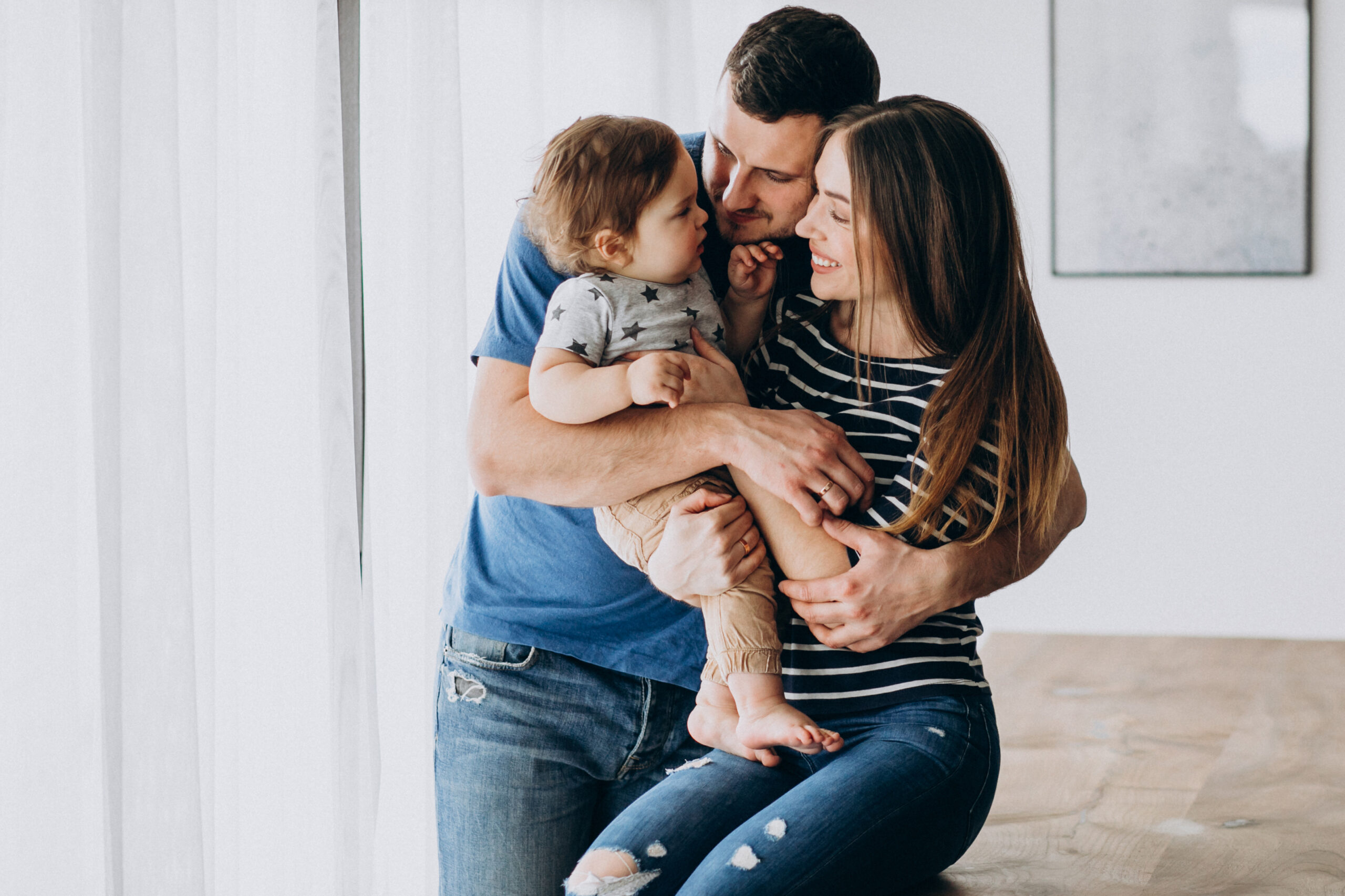 young family with their little son at home